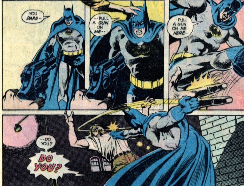 batman reacts badly to guns