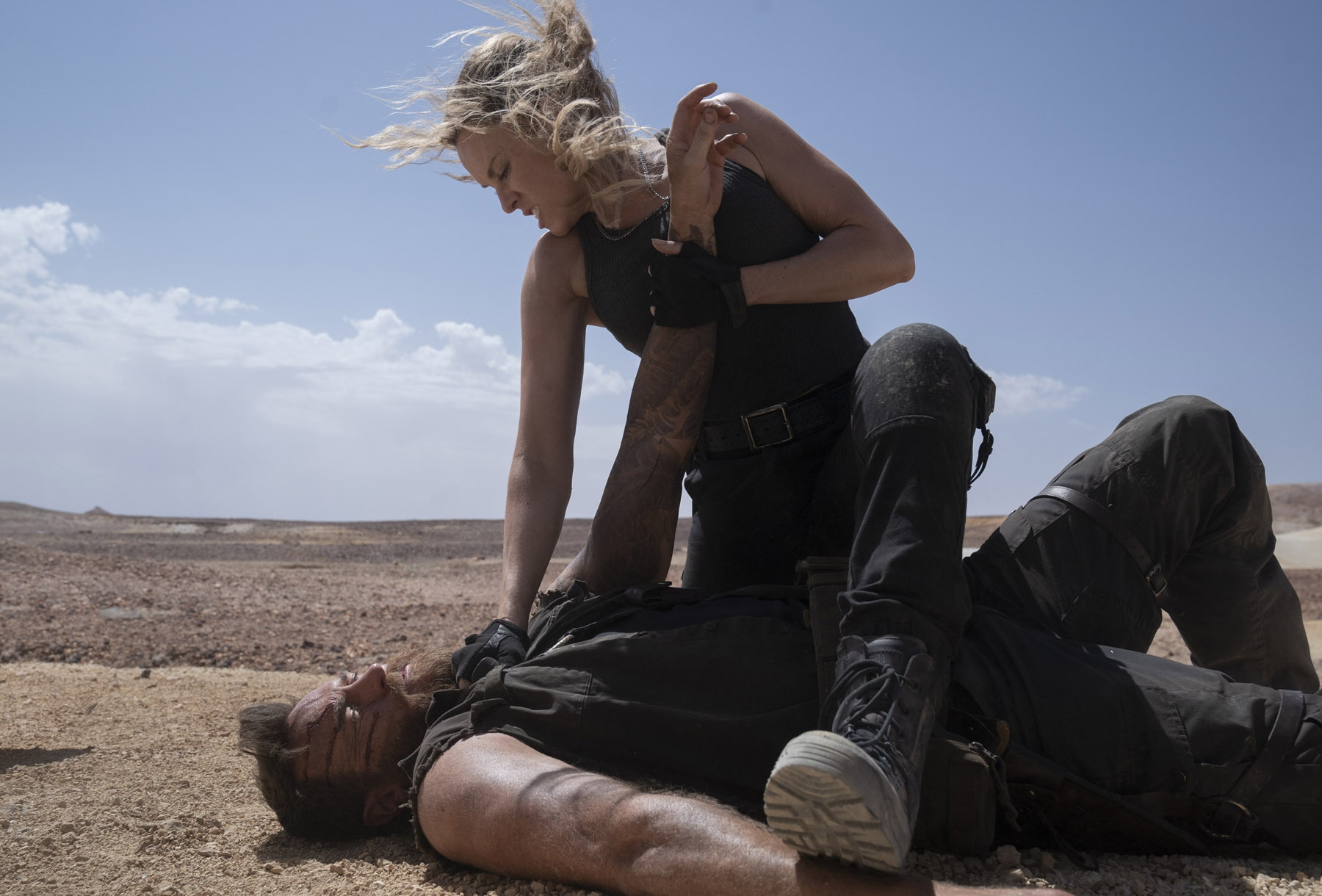 Josh Lawson as Kano and Jessica McNamee as Sonya Blade