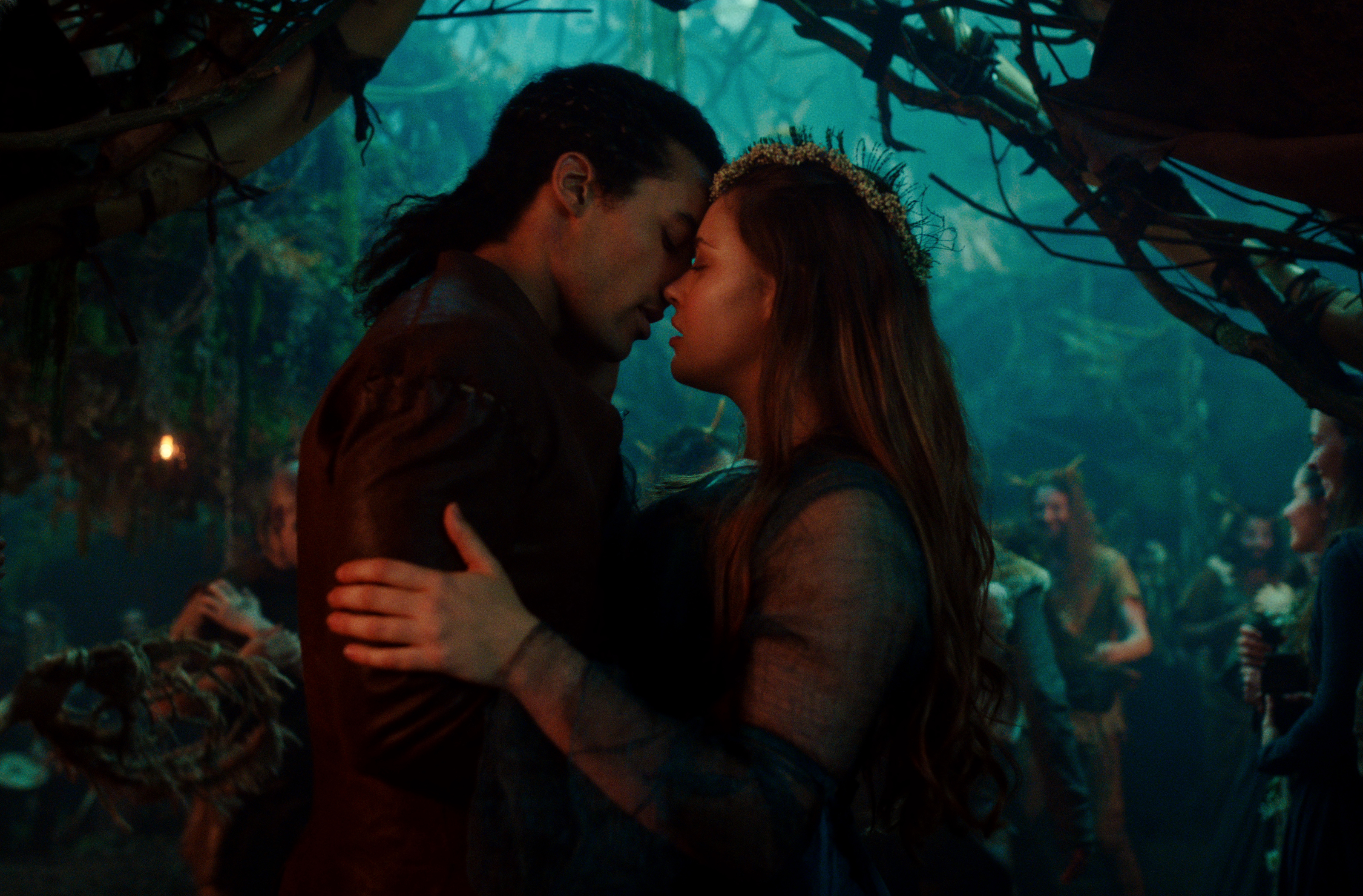 DEVON TERRELL as ARTHUR and KATHERINE LANGFORD as NIMUE